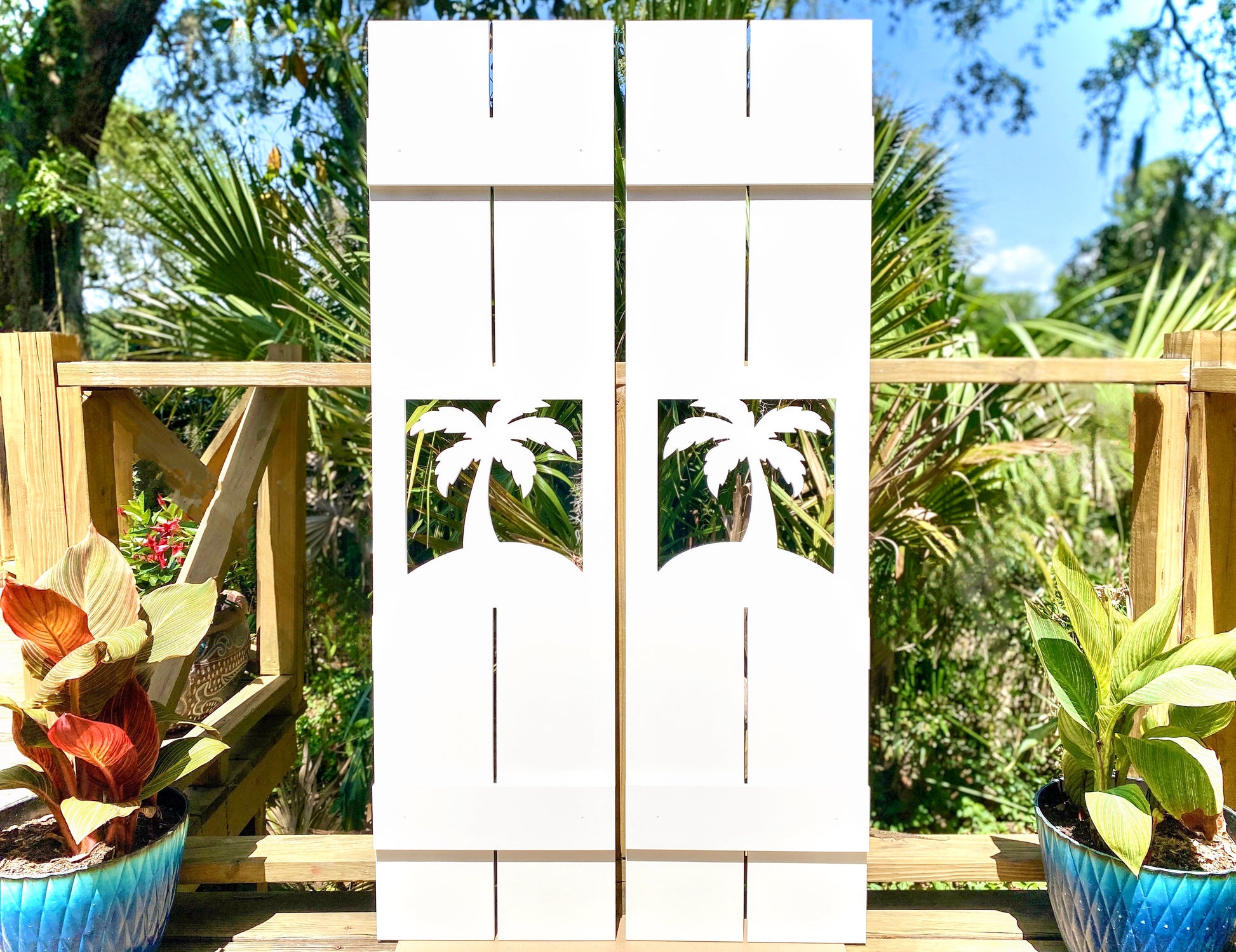 weatherproof palm tree window shutters - decorative shutters for beach house or coastal home outdoor decor - board and batten shutters