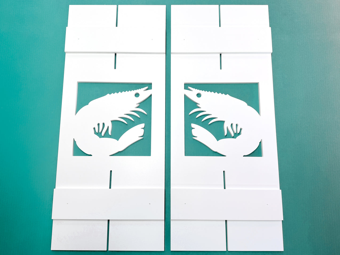 Shrimp window shutters for coastal or river home. Weatherproof PVC exterior decor. 