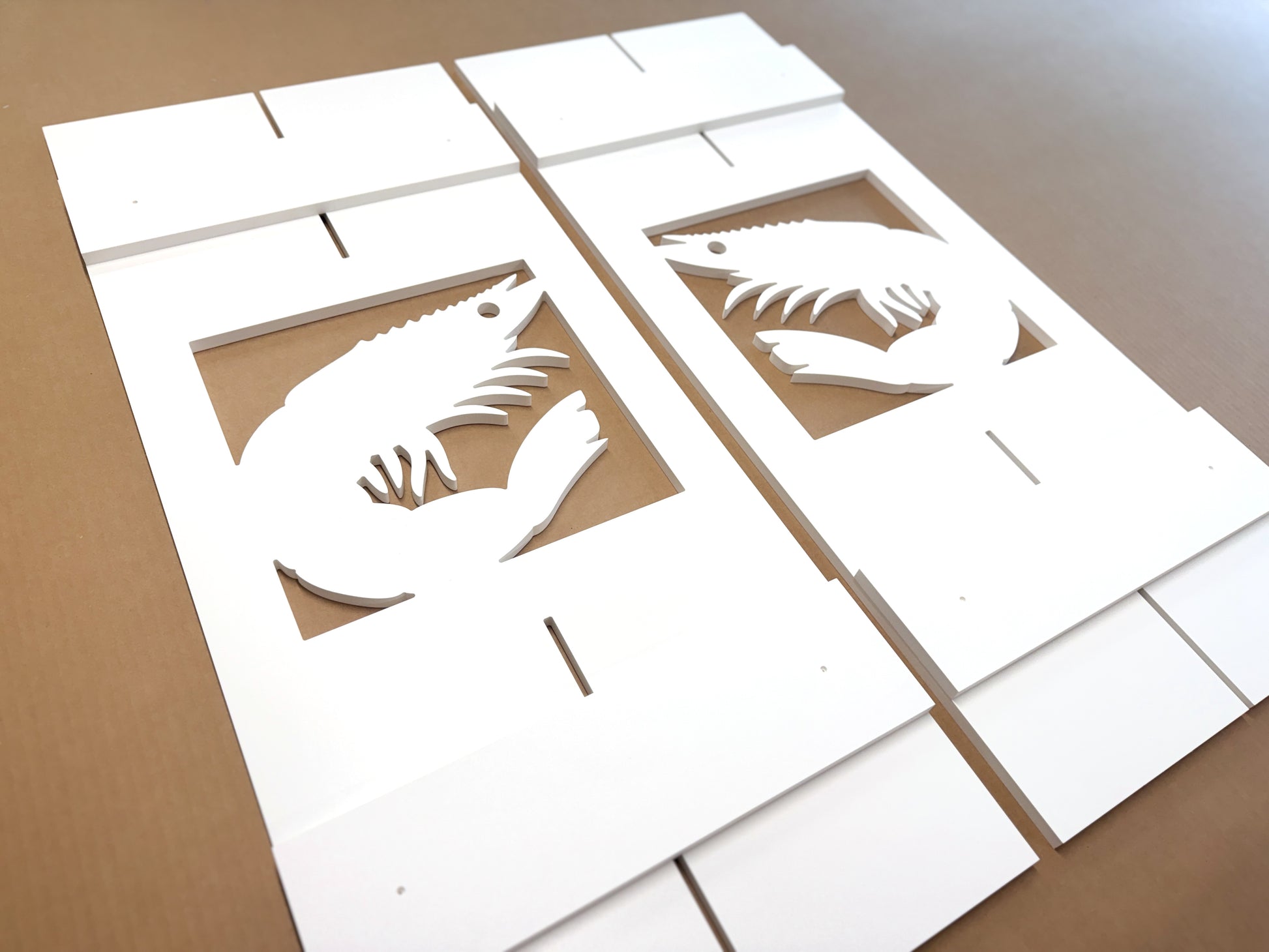 Exterior coastal window shutters with shrimp cutouts