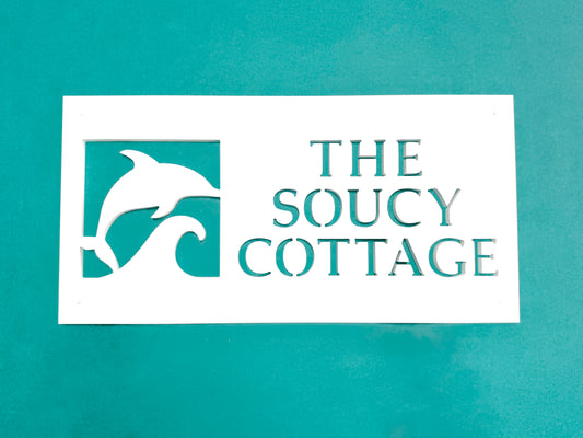 personalized beach house name sign with dolphin jumping a wave design. Outdoor coastal home porpoise custom art.
