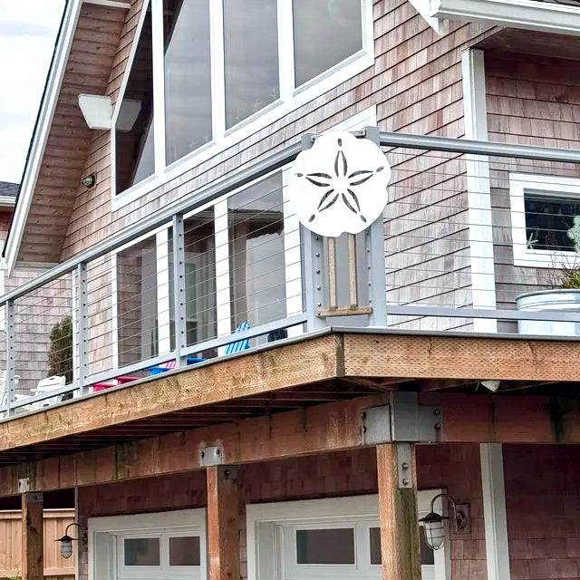 large outdoor sand dollar, coastal beach house exterior decor