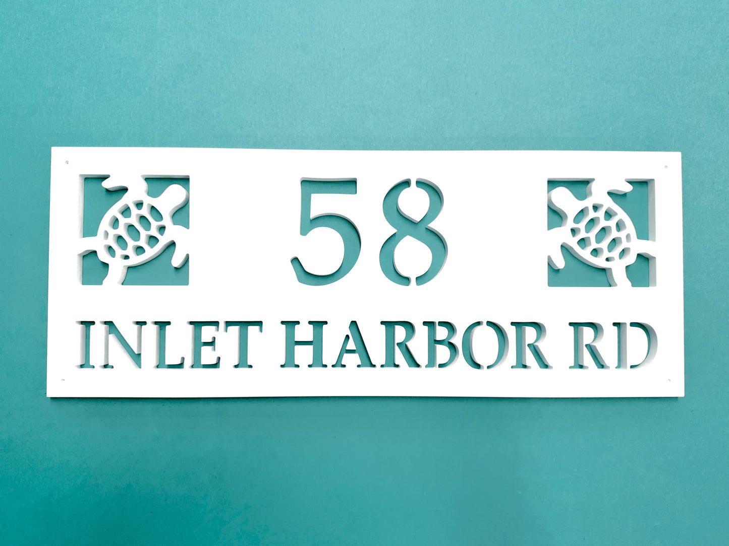 house number sign with street name, coastal sea turtle beach house address sign