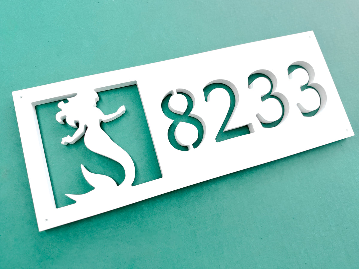 mermaid beach house address sign