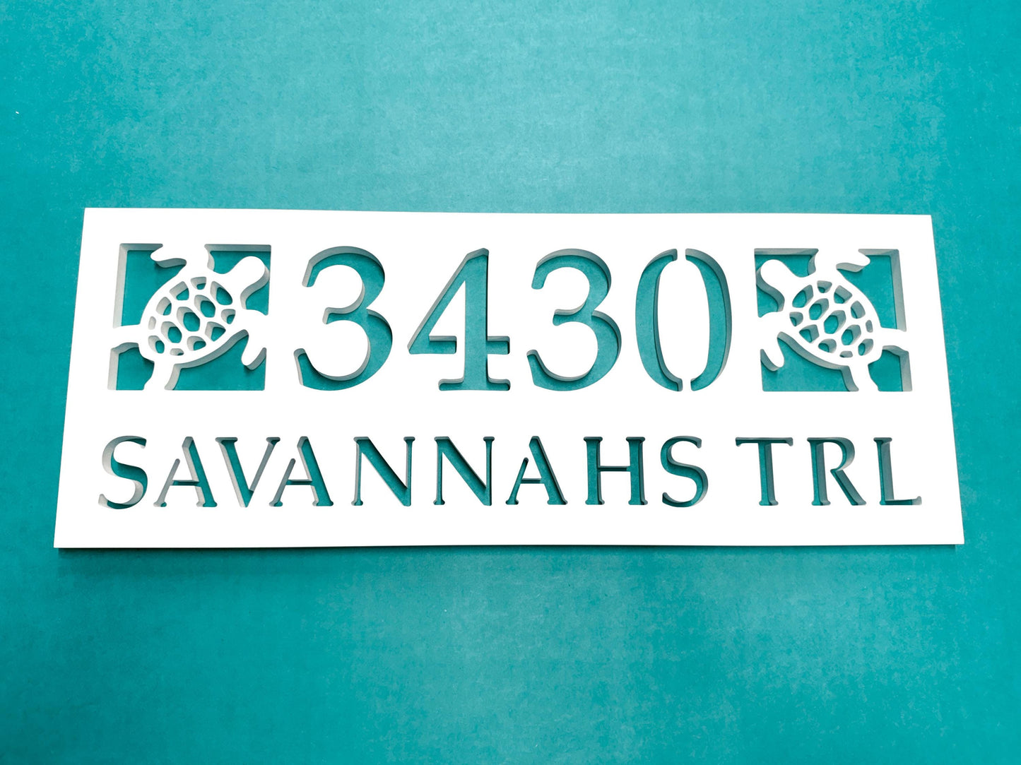 address sign with street name and house numbers, with two sea turtles. coastal beach house address sign
